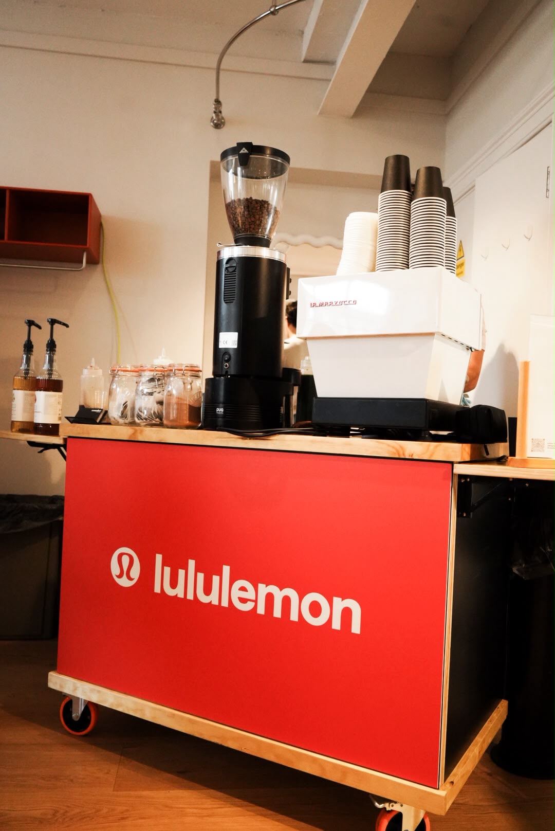 The cart branded in lululemon colours
